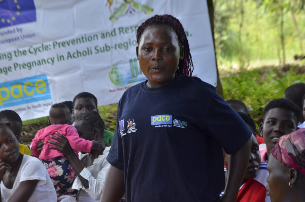 Apiyo Docus shares her experience and inspires her peers during a youth engagement session under the "Breaking the Cycle" project